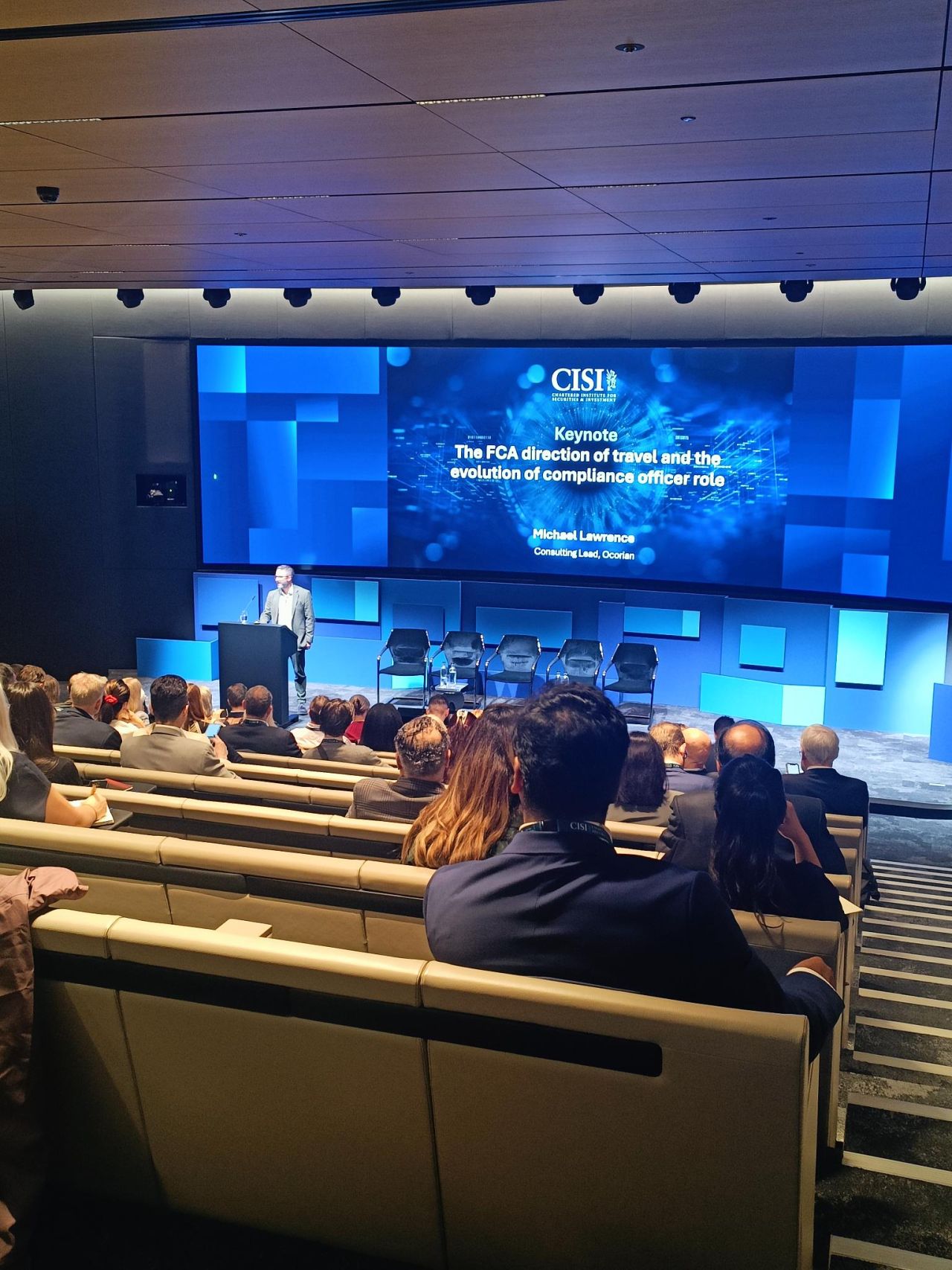 A speaker presenting at the previous Compliance Conference